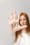 girl with the word "no" written on her palm